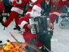 santas-dance-next-to-a-fire-during-the-santa-claus-wintergames-in-northern-swedish-town-of-gallivare-november-20-2005-santa-claus-wintergames-is-an-annual-gathering-of-santas-from-all-over-the-world-a